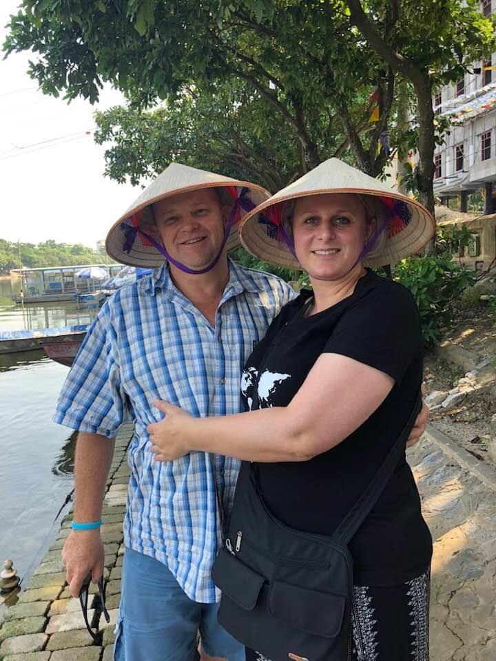 A photo of me and Leon in Vietnam.  We are wearing our leaf hat.