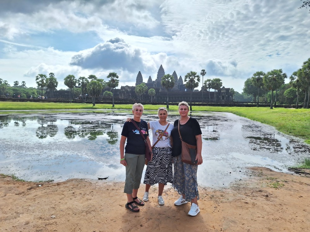 Me, my mother and Ahnel standing infront of the Angkor Wat in Cambodia.