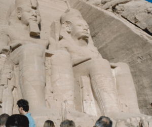 The image describes the hugeness of the statues Meeting the Pharaohs